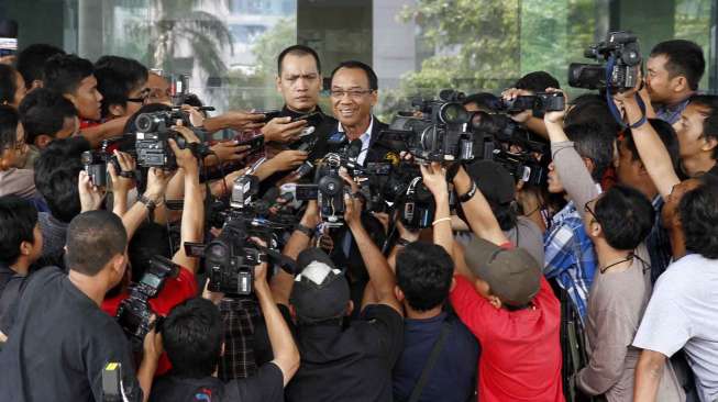 Menteri ESDM Jero Wacik usai memenuhi panggilan KPK, Jakarta, Rabu (16/7). [suara.com/Adrian Mahakam]