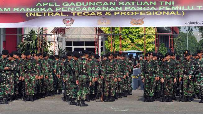 Apel gabungan TNI di JIExpo Kemayoran Jakarta, Kamis (21/8). [suara.com/Adrian Mahakam]