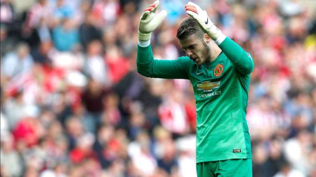 Reaksi gusar kiper Manchester United, David de Gea, dalam laga kontra Sunderland yang berkesudahan 1-1, Minggu (24/8/2014). [Reuters/Andrew Yates]