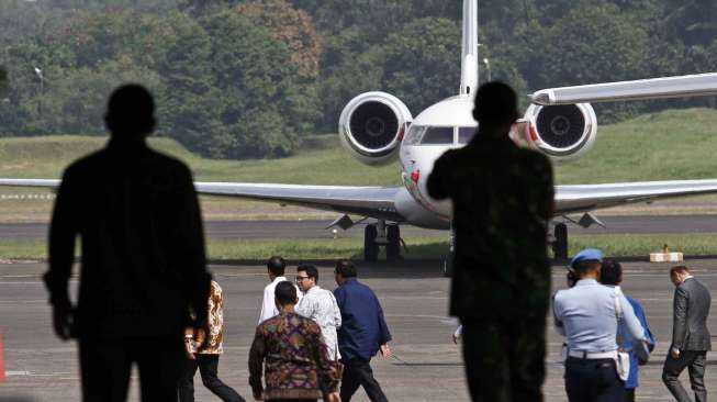 Presiden terpilih Joko Widodo bertolak menuju Bali dari Bandara Halim Perdana Kusuma Jakarta, Rabu (27/8). [suara.com/Kurniawan Mas'ud]