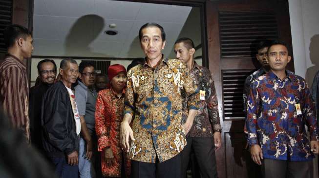 Presiden terpilih Joko Widodo menghadiri sekaligus meresmikan terbentuknya SEKNAS TANI JOKOWI yang merupakan gabungan dari beberapa organisasi petani seluruh Indonesia di gedung Perpustakaan Nasional Jakarta, Kamis (4/9). [suara.com/Kurniawan Mas'ud]