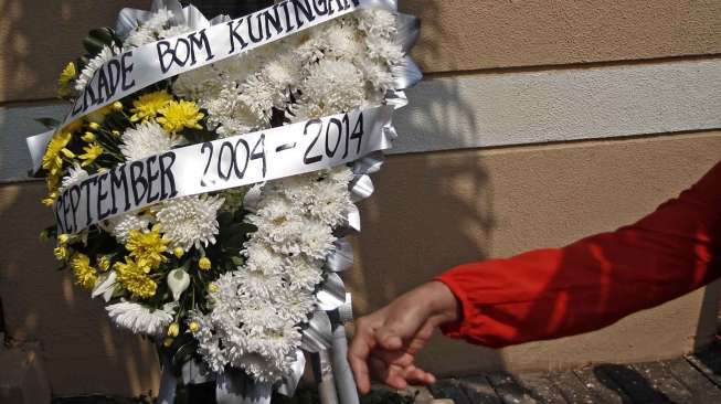Mengenang satu dekade peristiwa bom Kuningan, Jakarta (9/9). [suara.com/Kurniawan Mas'ud]