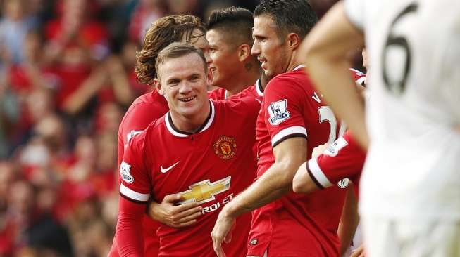 Wayne Rooney rayakan golnya ke gawang QPR [Reuters/Andrew Yates]