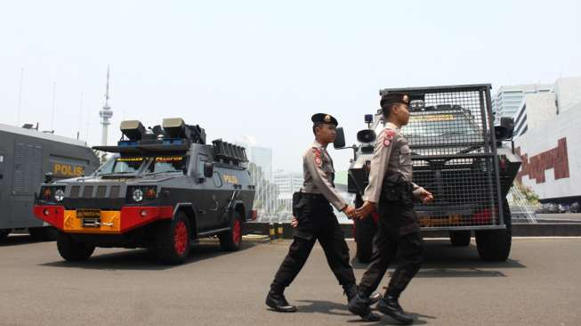 Pengamanan saat sidang paripurna RUU Pilkada di gedung DPR/MPR Jakarta, Kamis (25/9). [suara.com/Rengga Satria]