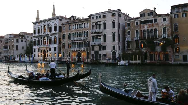 Entrance \"Hotel Aman\" tempat resepsi pernikahan George Clooney-Amal Alamuddin dilangsungkan, Sabtu (27/9/2014). (Reuters/Stefano Rellandini) 