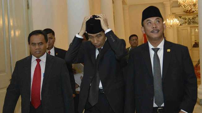 Presiden terpilih Joko Widodo dan Ketua DPRD DKI Jakarta Prasetyo Edi Marsudi (kanan). [Antara/Widodo S. Jusuf]