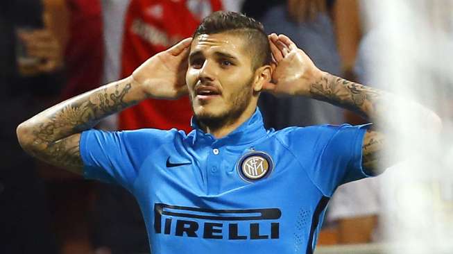 Pemain Inter Milan Mauro Icardi merayakan golnya ke gawang FK Qarabag. Pada laga Liga Europa di Giuseppe Meazza tersebut Inter Milan menang 2-0. (REUTERS/Giorgio Perottino) 