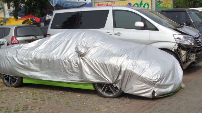 Mobil Lamborghini milik Hotman Paris di Satlantas Polres Jakarta Utara. [suara.com/Ismail]