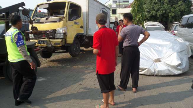 Mobil Lamborghini milik Hotman Paris di Satlantas Polres Jakarta Utara. [suara.com/Ismail]