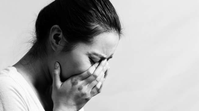 Ilustrasi perempuan menangis. (Shutterstock)