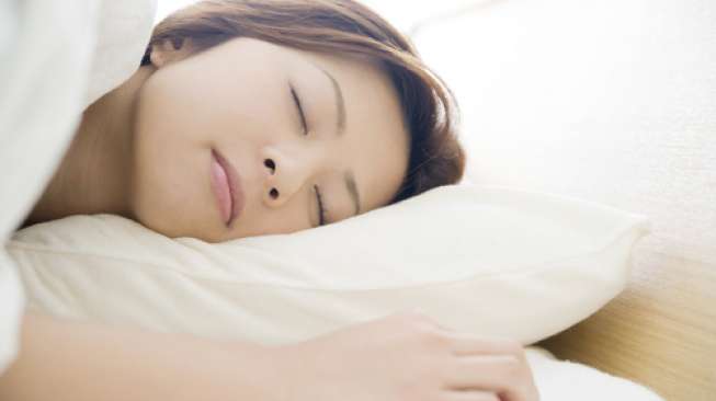 Ilustrasi perempuan tidur (shutterstock)