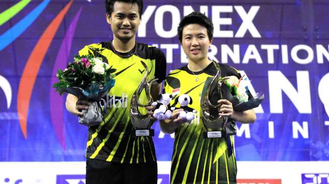 Tontowi Ahmad dan Liliyana Natsir menjuarai turnamen super series Prancis Terbuka 2014.