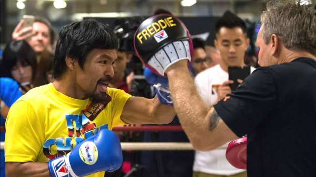 Pacquiao dan Mayweather Sepakat Bertarung demi Rp3,1 Triliun