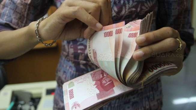 BI Intervensi, Rupiah Menguat ke Posisi Rp12.500