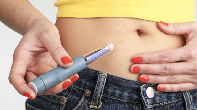 Ilustrasi suntik insulin. (Shutterstock)