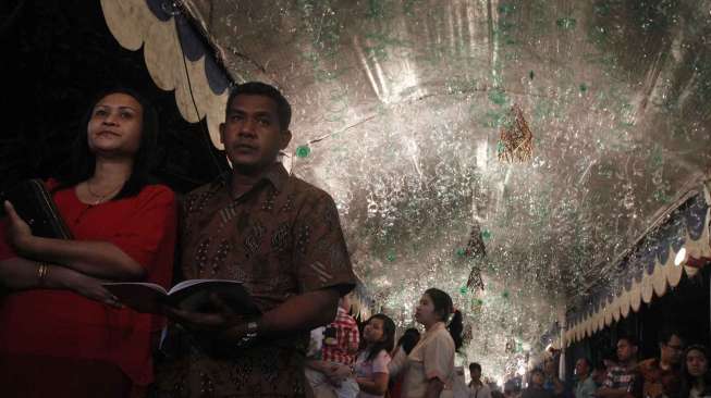 Misa Natal di Gereja Katedral, Rabu (24/12/2014) malam. (suara.com/Kurniawan Mas'ud)