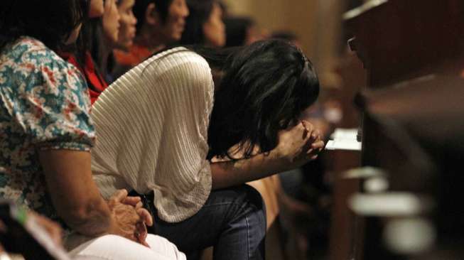 Misa Natal di Gereja Katedral, Rabu (24/12/2014) malam. (suara.com/Kurniawan Mas'ud)