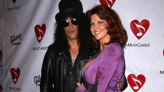 Gitaris Slash Ditinggalkan Istri dan Anak