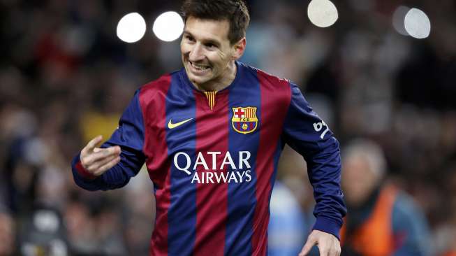 Pemain Barcelona Lionel Messi rayakan golnya ke gawang Atletico Madrid (22/1) [Reuters/Gustau Nacarino]