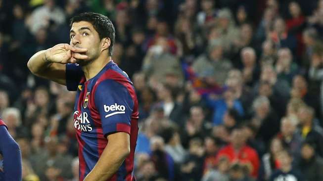 Reaksi Luis Suarez usai menutup pesta gol Barcelona ke gawang Levante (16/2) [Reuters/Gustau Nacarino]