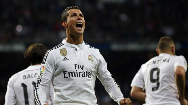 Bintang Real Madrid Cristiano Ronaldo merayakan golnya ke gawang Villarreal. REUTERS/Susana Vera