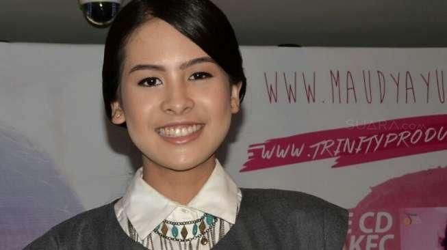 Artis Maudy Ayunda dalam acara rilis album keduanya yang bertajuk 'Moments' dan berisikan 10 lagu, di Jakarta, Rabu (1/4/2015). [Suara.com/Nanda Hadiyanti]