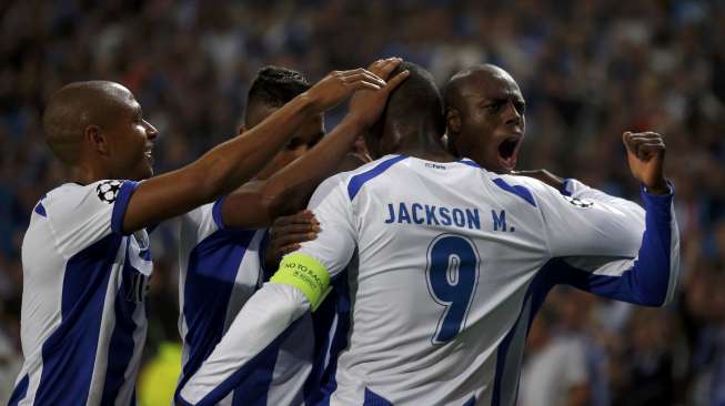 Pemain Porto rayakan kemenangan atas Bayern Munich (16/4) [Reuters/Rafael Marchante]