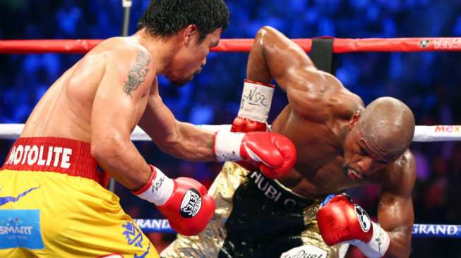 Laga Tinju Floyd Mayweather Jr dan Manny Pacquiao di Las Vegas, Minggu (3/5/2014) (Reuters/USA Today/Mark J Rebilas)