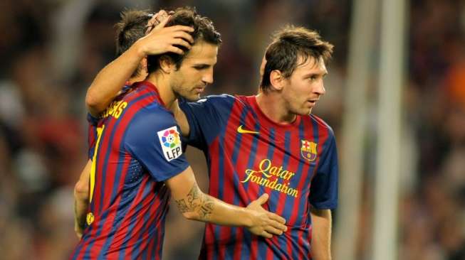 Lionel Messi dan Cecs Fabregas saat masih di Barcelona. (Shutterstock)