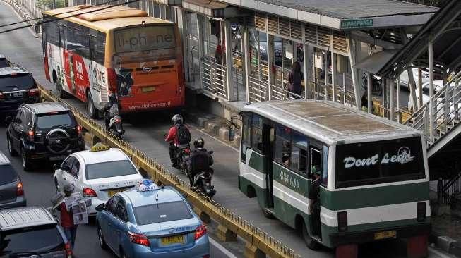 Transjakarta Gandeng Kopaja dan Kopami