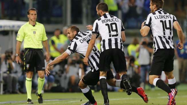 Giorgio Chiellini usai mencetak gol ke gawang Lazio (21/5) [Reuters/Giampiero Sposito]