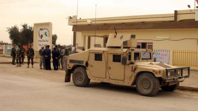 Sebuah mobil lapis baja Humvee milik tentara Amerika Serikat di Kirkuk, Irak (Shutterstock).