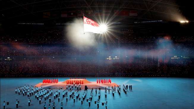 Upacara pembukaan SEA Games 2015, dihelat hari Jumat (5/6/2015) di National Stadium, Singapura. Pembukaan pesta olah raga se-Asia Tenggara itu diramaikan pesta kembang api. [Reuters/Singapore SEA Games Organising Comittee]