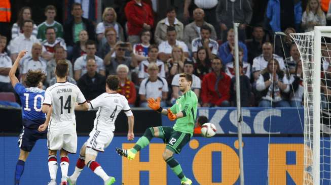 Mix Diskerud mencetak gol ke gawang Jerman (11/6) [Reuters/Ina Fassbender]