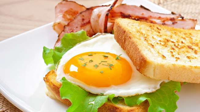 Ilustrasi telur dan roti. (Shutterstock)
