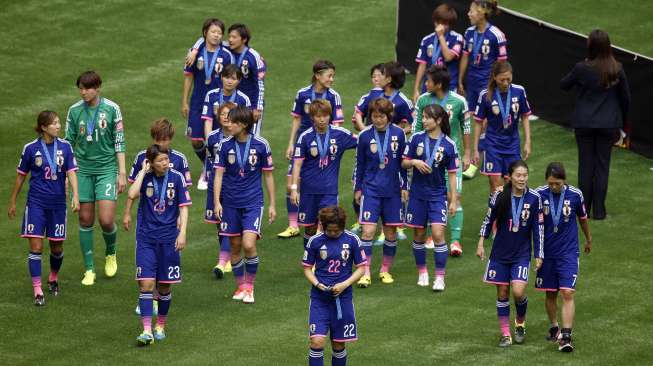 Reaksi pemain Jepang usai menerima medali perak di Piala Dunia Wanita (6/7) [Reuters]