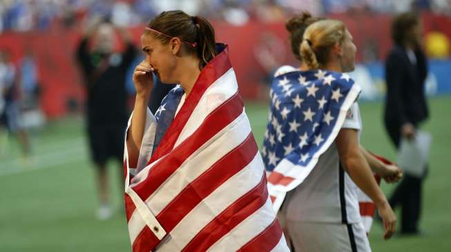 Reaksi pemain AS Alex Morgan usai timnya berhasil menjuarai Piala Dunia Wanita 2015 (6/7) [Reuters]