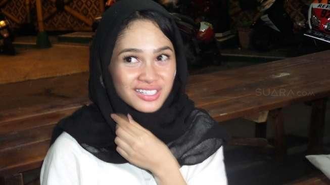 Andien Aisyah dan Fans Ajak Anak Yatim Bermain Bersama