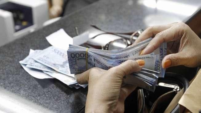 Rupiah Akhir Pekan Ini Dibuka Menguat 33 Poin