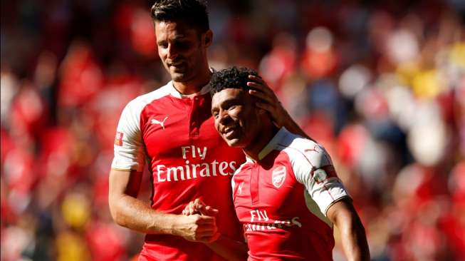 Punggawa Arsenal merayakan kemenangannya dalam duel Community Shield kontra Chelsea di Stadion Wembley, London, Minggu (2/8/2015)