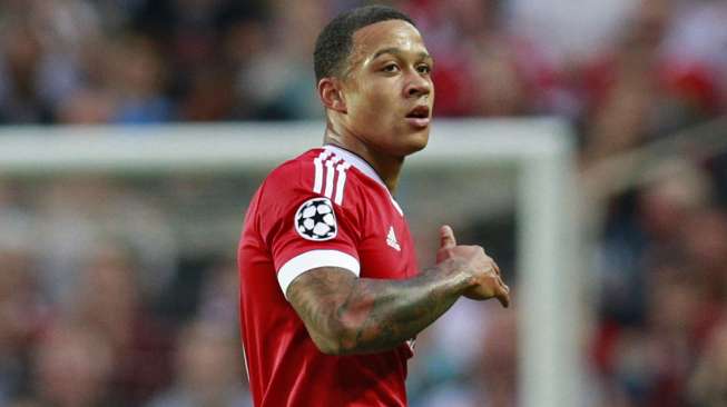 Pemain MU Memphis Depay rayakan gol ke gawang Club Brugge (19/8) [Reuters/Jason Cairnduff]