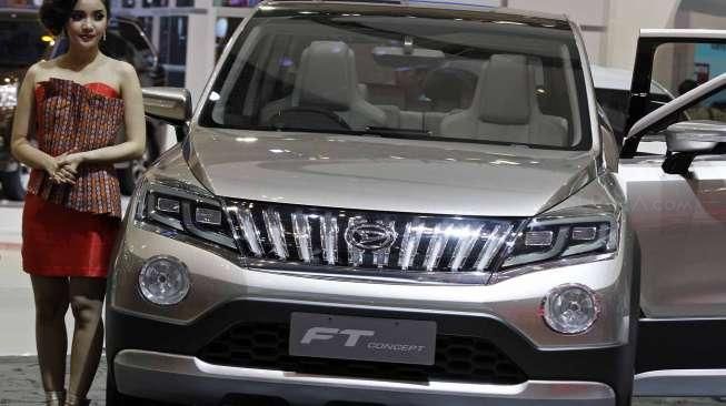 Daihatsu memperkenalkan tak kurang dari empat varian mobil konsep terbaru mereka di ajang pameran GIIAS 2015 di ICE BSD City, Tangerang Selatan, seperti terlihat Kamis (21/8/2015). [Suara.com/Kurniawan Mas'ud]