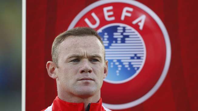 Kapten Inggris Wayne Rooney sebelum pertandingan kualifikasi Piala Eropa kontra San Marino (6/9) [Reuters/Carl Recine]