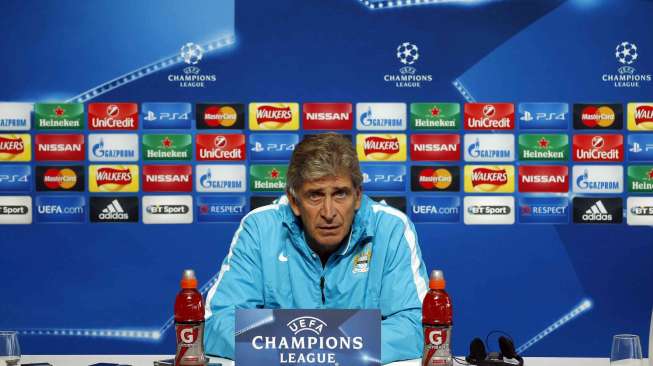 Manajer Manchester City Manuel Pellegrini menghadiri konferensi pers jelang pertandingan (15/9) [Reuters/Carl Recine]