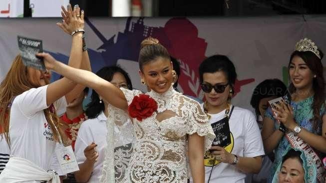 Penyanyi Agnes Monica atau yang akrab disapa Agnez Mo menghadiri perayaan Hari Perdamaian Dunia di Jakarta, Minggu (20/9/2015). [Suara.com/Kurniawan Mas'ud]