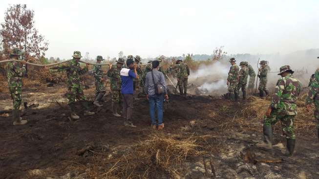 Berhasil Padamkan Ribuan Titik Api, TNI Teruskan Kerja