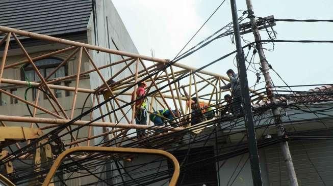 Crane Jatuh dan Timpa Apartemen, 1 Tewas dan Lukai 6 Orang