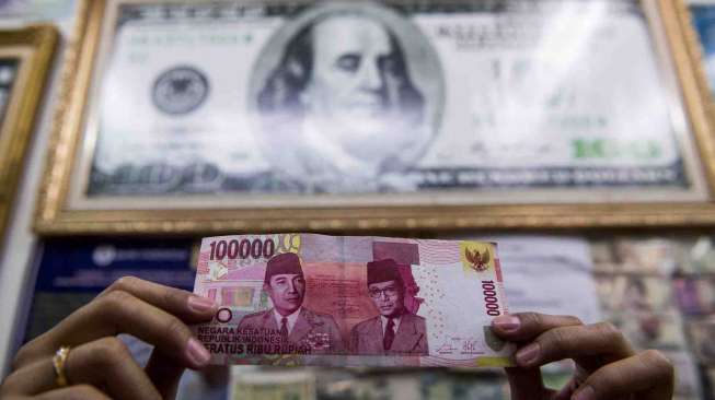 Rupiah Melemah 20 Poin, Ditutup di Posisi Rp13.414 per Dolar AS