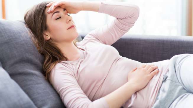Ilustrasi kelelahan, capek, PMS, Pusing, Sakit Perut. (Shutterstock)