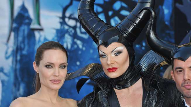 LOS ANGELES, CA - MAY 29, 2014: Angelina Jolie & characters at the world premiere of her movie "Maleficent" at the El Capitan Theatre, Hollywood.